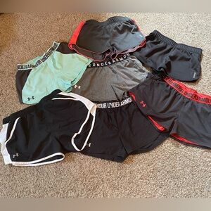 7 pair women’s size small running shorts